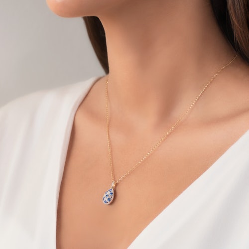 Zawieszka Savicki: dwukolorowe złoto, niebieskie szafiry, diamenty